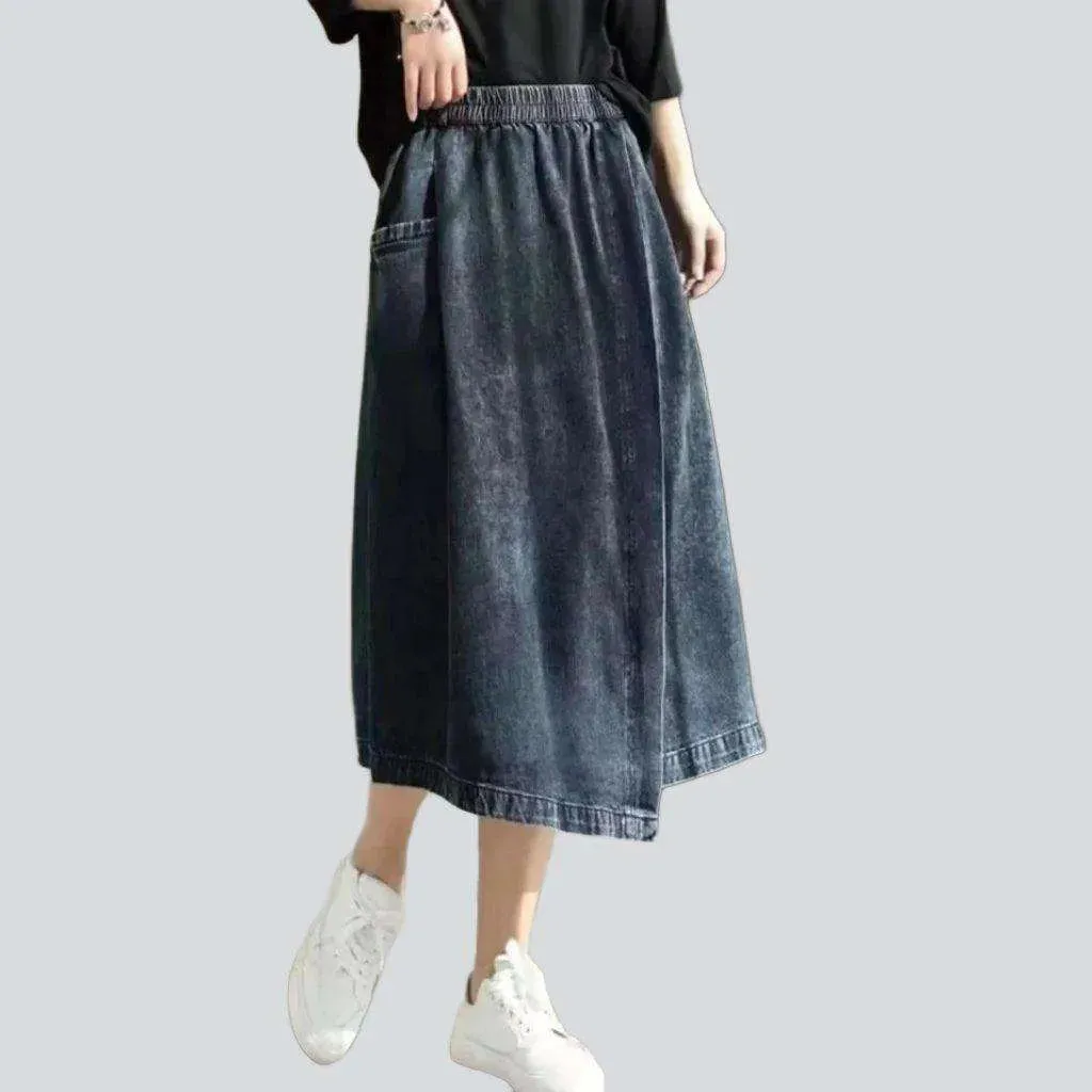 Asymmetric denim skirt with rubber