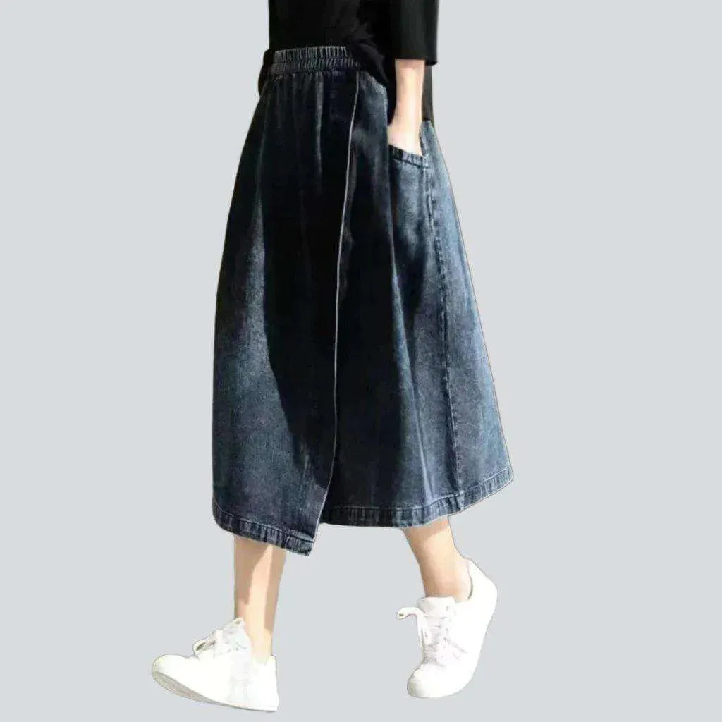 Asymmetric denim skirt with rubber