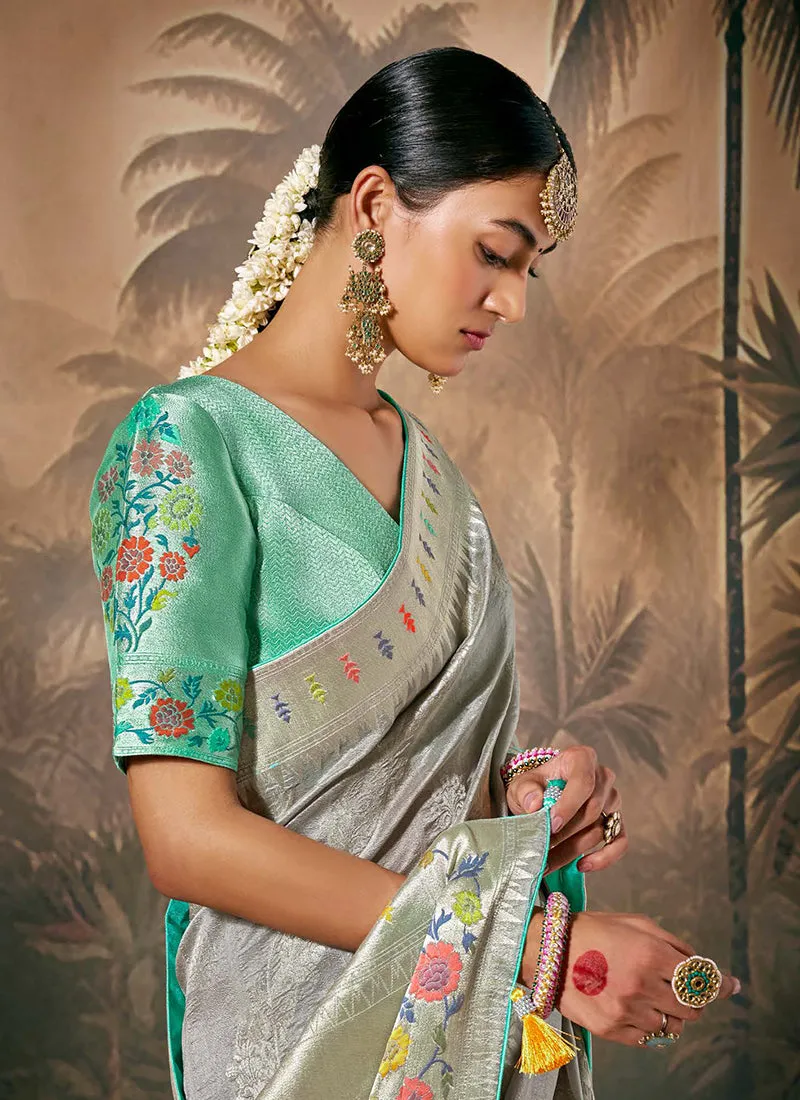 Grey And Teal Floral Munga Silk Saree