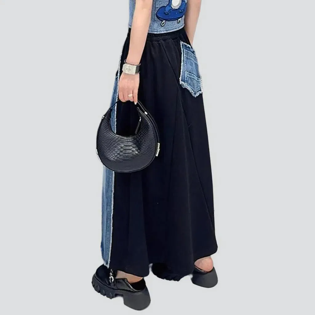 Raw hem whiskered denim skirt