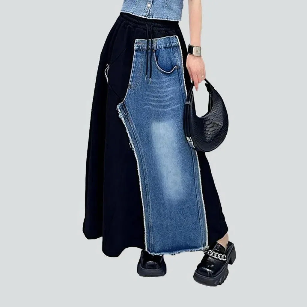 Raw hem whiskered denim skirt